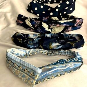 4 piece head band with elastic bands.  Assorted shades of blue